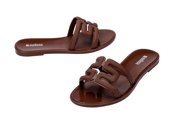 Melissa M Slide Ad Brown