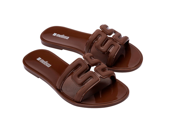 Melissa M Slide Ad Brown